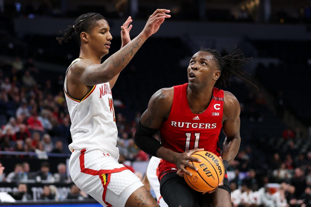 Former Rutgers center Clifford Omoruyi (11) looks to shoot  against Maryland's Julian Reese (10) during a March 13 game at Target Center in Minneapolis. Omoruyi was scheduled to begin a recruiting visit to Kansas State on Wednesday.