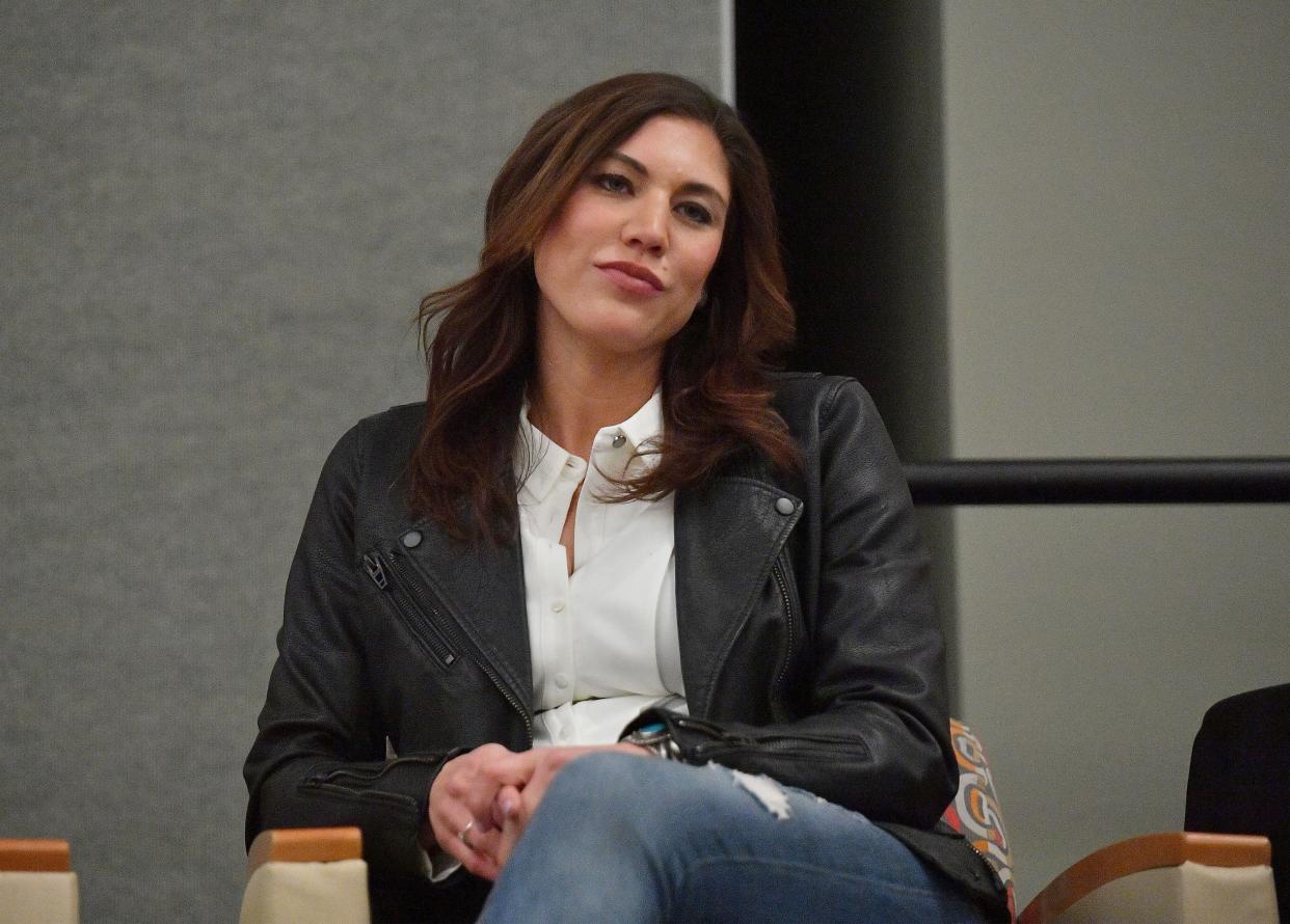 Soccer player Hope Solo sits on stage before 'Champion & Activist: An Evening With Hope Solo' at University of New Mexico on Jan. 27, 2020.