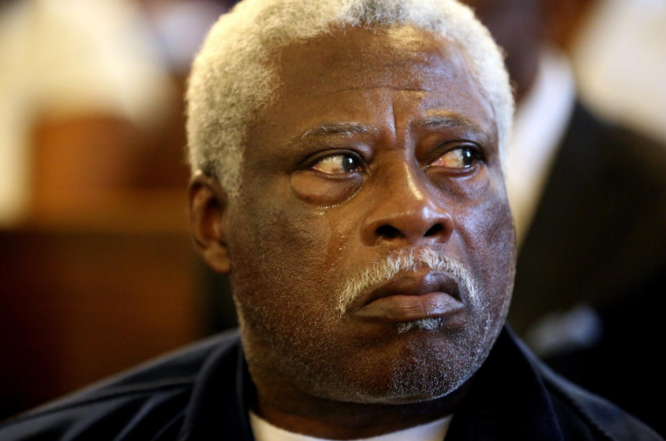 Rev. Sandy Drayton sheds a tear during a prayer vigil held at Morris Brown AME Church for the victims of Wednesday's shooting at Emanuel AME Church on Thursday, June 18, 2015 in Charleston, S.C. 