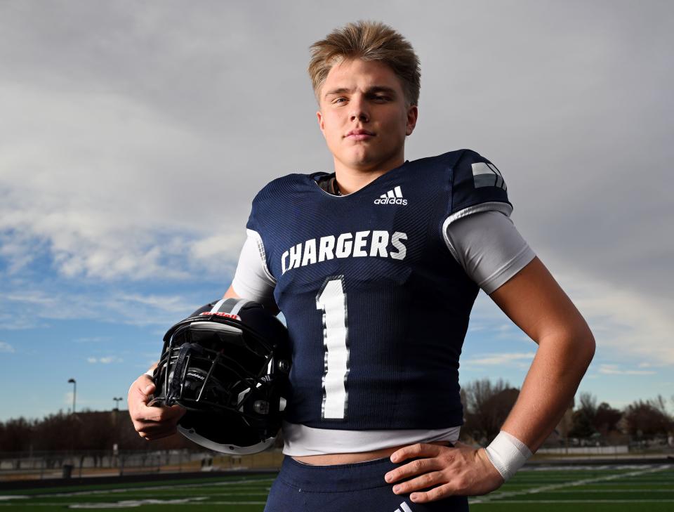 Corner Canyon’s Isaac Wilson poses for Mr. Football photos in Draper on Wednesday, Dec. 6, 2023. | Scott G Winterton, Deseret News