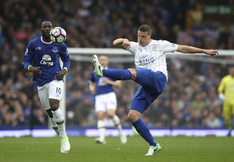Leicester City's Marc Albrighton, right, clears the ball during the English Premier League soccer match against Everton at Goodison Park in Liverpool, England, Sunday April 9, 2017. (Nick Potts/PA via AP)