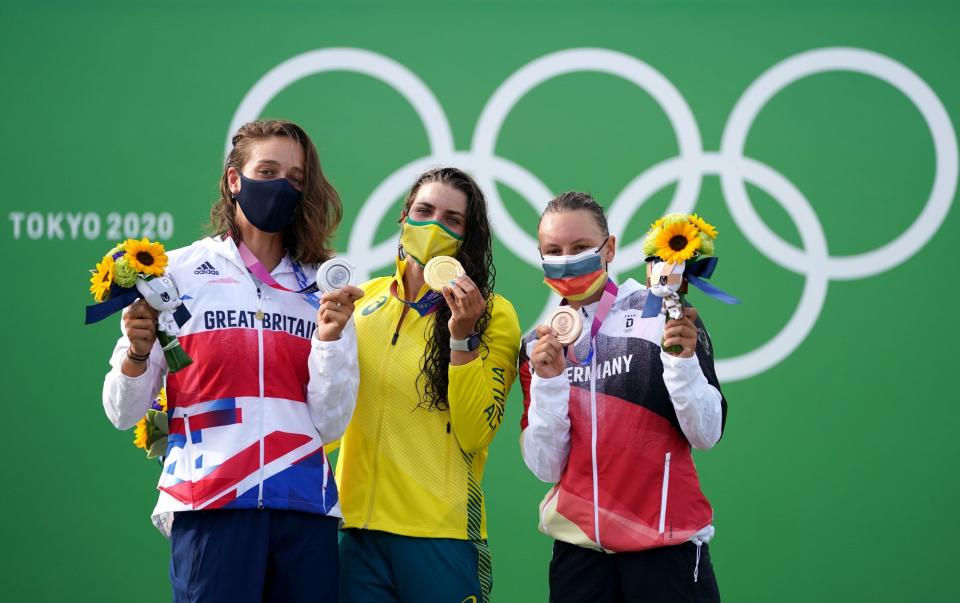 Australia's Jessica Fox (centre), Great Britain's Mallory Franklin (left) and Germany's Andrea Herzog (right) show off their medals - PA