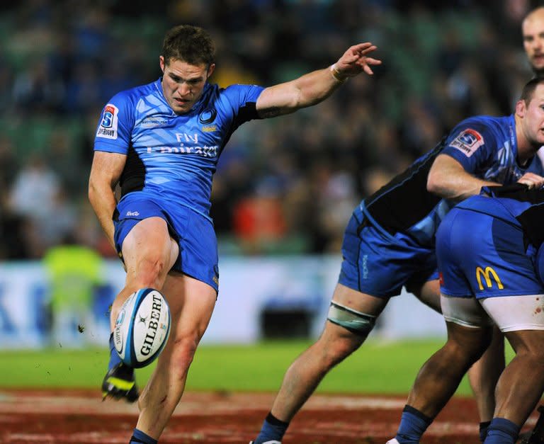 Josh Holmes of the Western Force makes a clearing kick during their Super15 rugby union match against the South African Lions, in Perth, on May 26, 2012. The 2013 Super 15 season kicks off this weekend with two all-Australian ties as players seek to impress national selectors ahead of the looming British and Irish Lions tour Down Under. The Force face Melbourne Rebels in their opener on Friday