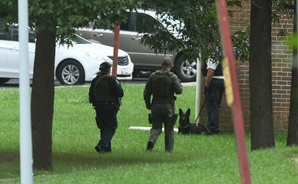 Authorities respond to a shooting in Harford County, Md., Thursday, Sept. 20, 2018. Authorities say multiple people have been shot in northeast Maryland in what the FBI is describing as an "active shooter situation." (Jerry Jackson /The Baltimore Sun via AP)