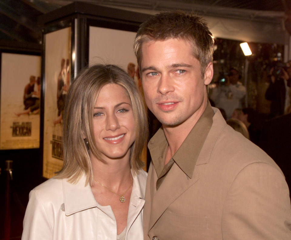 Jennifer Aniston, seen here with Brad Pitt in 2001, is reportedly pregnant with his baby. Source: Getty