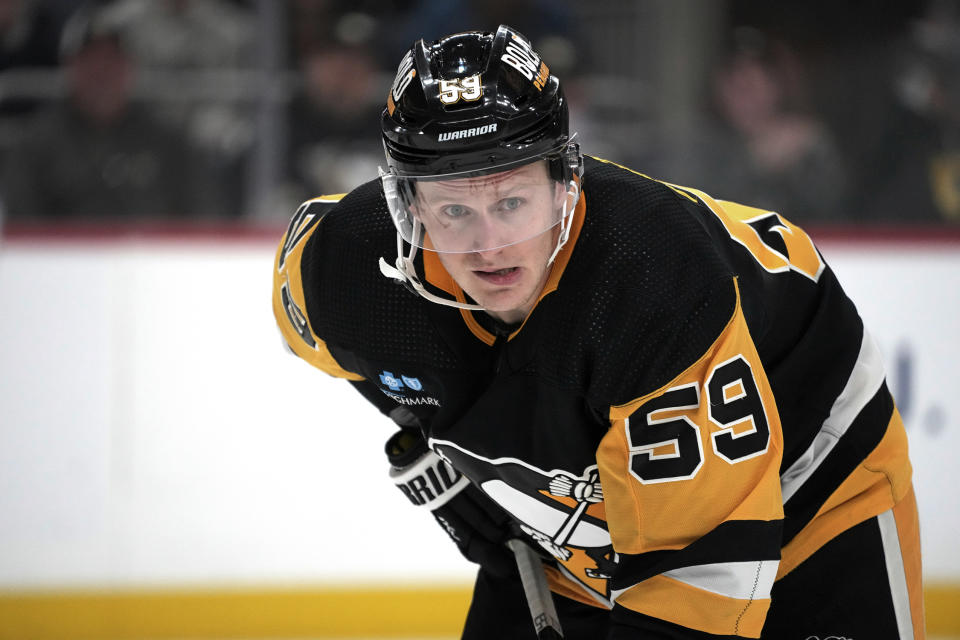 FILE - Pittsburgh Penguins' Jake Guentzel prepares for a faceoff during the second period of the team's NHL hockey game against the Florida Panthers in Pittsburgh, Jan. 26, 2024. The Carolina Hurricanes made the biggest splash in the league on the eve of the NHL trade deadline. Carolina acquired two-time 40-goal-scoring winger Guentzel in a blockbuster deal finalized Thursday night, March 7, with the Penguins. Guentzel was considered the top player available at the deadline. (AP Photo/Gene J. Puskar, File)