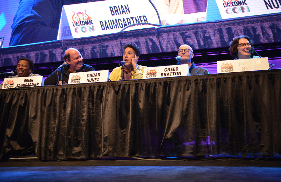 LOS ANGELES, CALIFORNIA - OCTOBER 12: (L-R) Stephen Kramer Glickman, Kate Flannery, Leslie David Baker, Brian Baumgartner, Oscar Nunez, Creed Bratton and Phyllis Smith speak onstage at "The Office" Reunion panel at 2019 Los Angeles Comic-Con at Los Angeles Convention Center on October 12, 2019 in Los Angeles, California. (Photo by Chelsea Guglielmino/Getty Images)