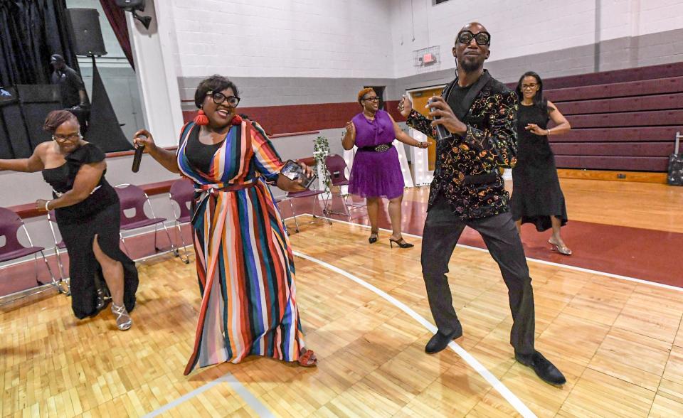 Chunsta Miller, middle, and Vaughn Newman dance with others at the end of the 2024 African American Leadership Society awards at the Westside Community Center in Anderson, S.C. Friday, June 21, 2024. The fundraiser helping the Jane Edna Hunter Empowerment Center with the Urban League of the Upstate, recognized area leaders.
