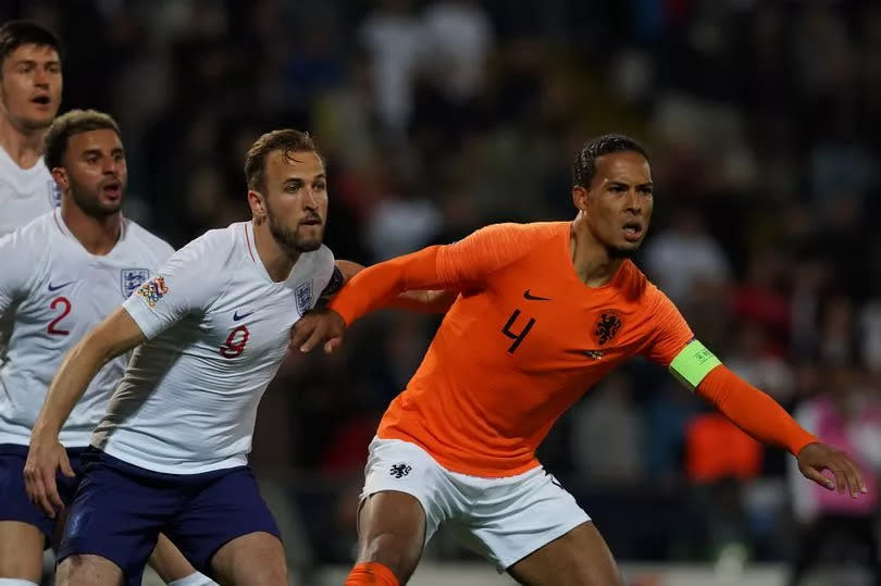 Virgil Van Dijk of Netherlands and Liverpool Football Club with Harry Kane of England and Tottenham Hotspur FC in action during the UEFA Nations League Semi-Final match between Netherlands and England at Estadio D. Afonso Henriques on June 6, 2019 in Guimaraes, Portugal.