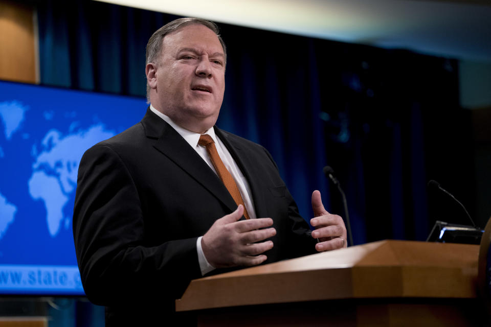 Secretary of State Mike Pompeo speaks at a news conference in the press briefing room at the State Department in Washington, Friday, Sept. 14, 2018, in Washington. Pompeo says his Obama-era predecessor John Kerry has been 'actively undermining' U.S. policy on Iran. (AP Photo/Andrew Harnik)