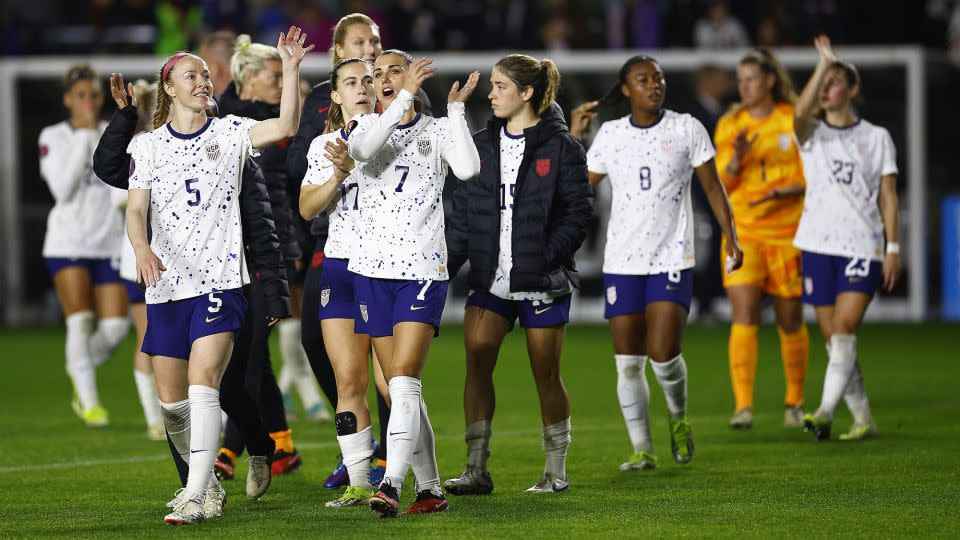US players celebrate after their 5-0 win. - Ronald Martinez/Getty Images