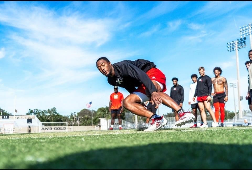 Dominique Robinson works on speed drills as he prepares for the NFL combine in Fort Meyers, Florida.