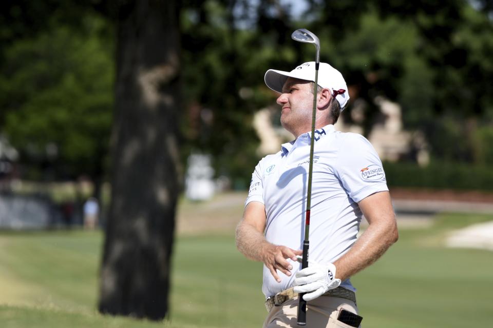 Brendon Todd chips onto the 17th green during the third round of the Charles Schwab Challenge golf tournament at Colonial Country Club, Saturday, May 28, 2022, in Fort Worth, Texas. (AP Photo/Emil Lippe)