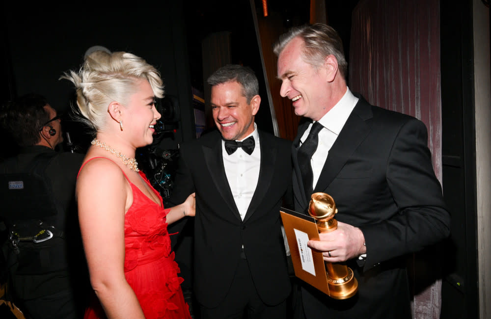 Oppenheimer's Christopher Nolan celebrates with stars Matt Damon and Florence Pugh credit:Bang Showbiz