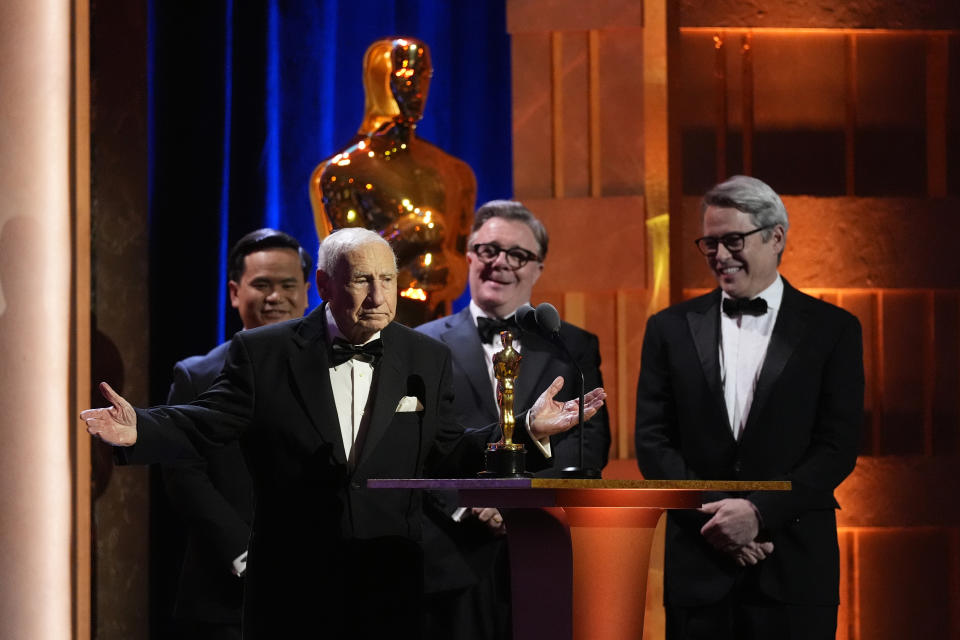 Mel Brooks accepts his honorary award during the Governors Awards on Tuesday, Jan. 9, 2024, at the Dolby Ballroom in Los Angeles. Matthew Broderick, far right and Nathan Lane look on. (AP Photo/Chris Pizzello)
