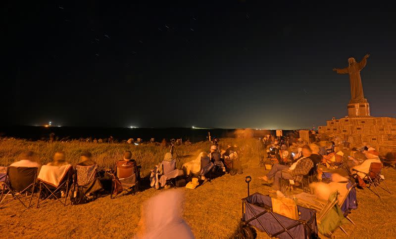 Spectators gather at predawn to watch the launch of SpaceX’s Starship near Brownsville