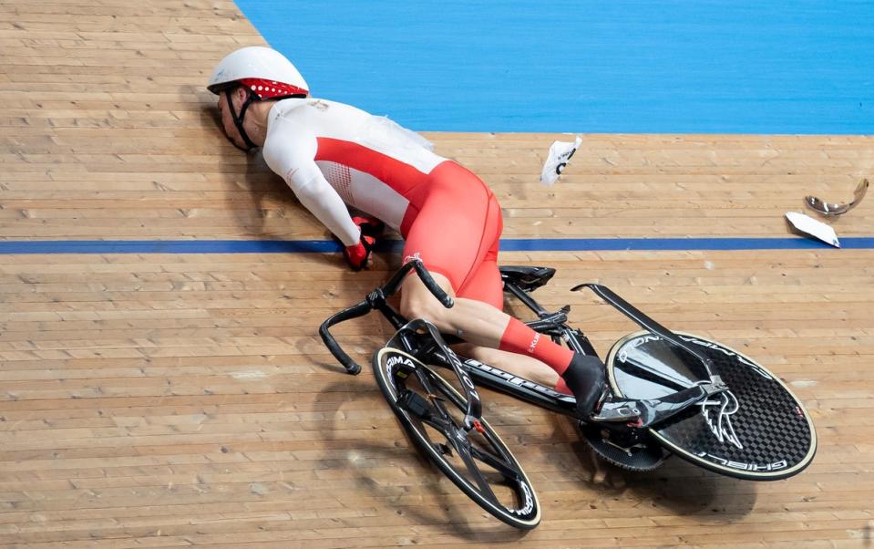 Joe Truman of Team England crashes during the Men’s Track Cycling Keirin Second Round Heat One on day two of the Birmingham 2022 Commonwealth Games at Lee Valley Velopark Velodrome (Getty Images)