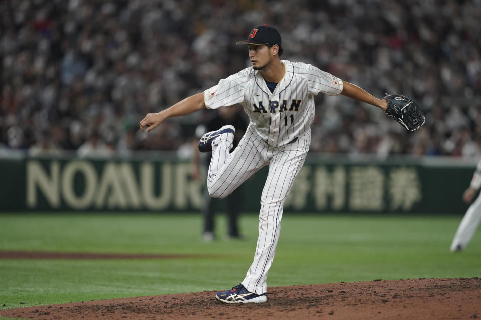 Japan's relief pitcher Yu Darvish throws during the seventh inning of the quarterfinal game between Italy and Japan at the World Baseball Classic (WBC) at Tokyo Dome in Tokyo, Japan, Thursday, March 16, 2023. (AP Photo/Toru Hanai)