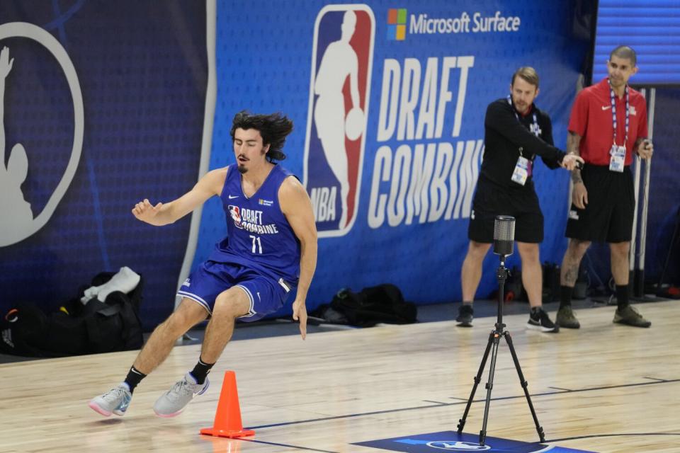 Jaime Jaquez Jr. runs and slides during an NBA Draft Combine drill