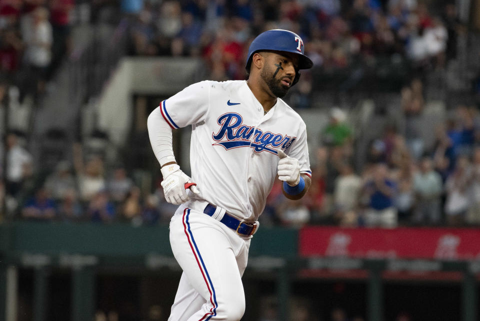 Texas Rangers' Ezequiel Duran jogs around the bases after hitting a solo home run in the bottom of the fourth inning of a baseball game against the Detroit Tigers in Arlington, Texas, Thursday, June 29, 2023. (AP Photo/Emil T. Lippe)