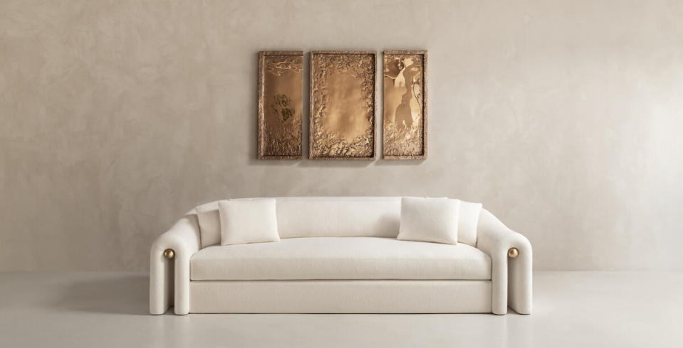 Dmitriy & Co’s Palla sofa with cast bronze
