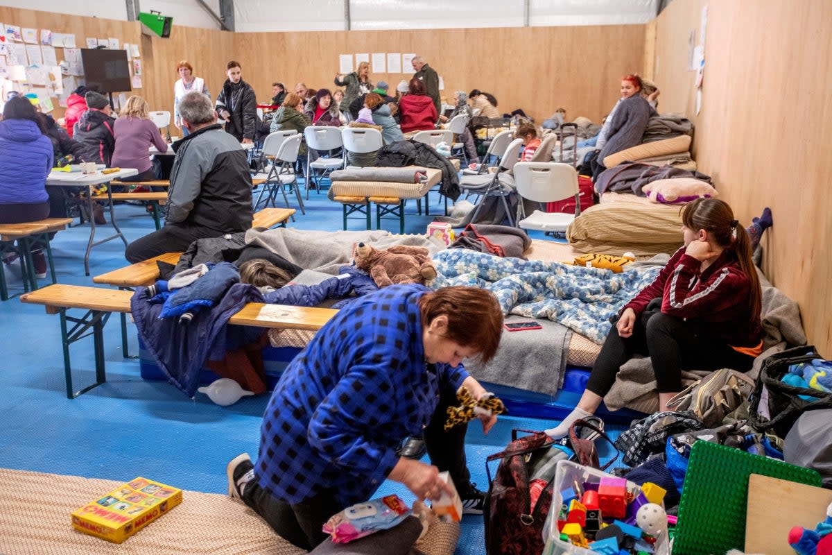 Ukrainian refugees resting at the National Reception Center in Rade, Norway (NTB/AFP via Getty Images)