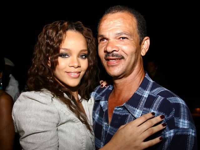 <p>David Crichlow/Shutterstock </p> Rihanna and her father, Ronald Fenty, at her 'A Girl Like Me' album launch in April 2006.