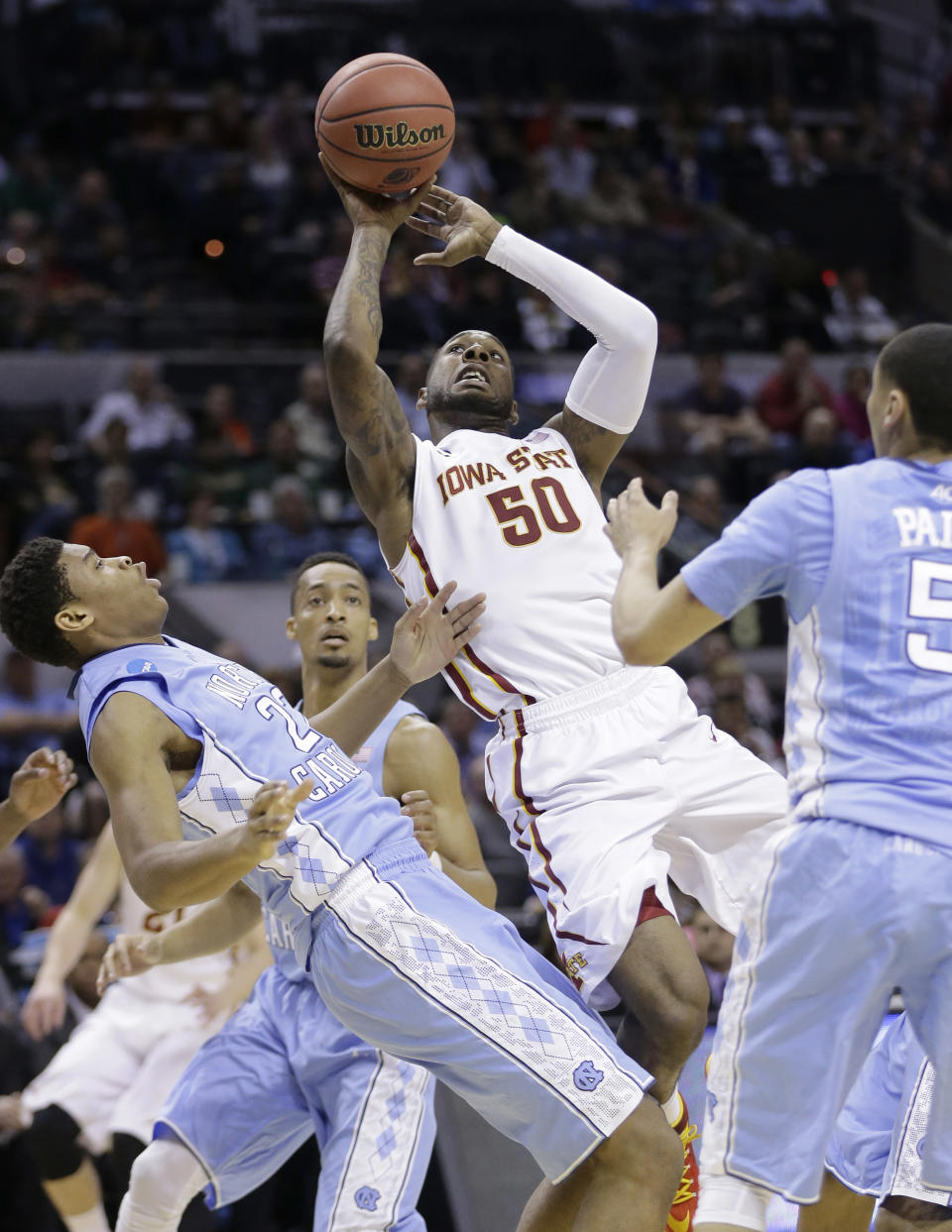 Iowa State's DeAndre Kane (50) shoots over North Carolina's Isaiah Hicks (22) during the first half of a third-round game in the NCAA college basketball tournament Sunday, March 23, 2014, in San Antonio. (AP Photo/Eric Gay)