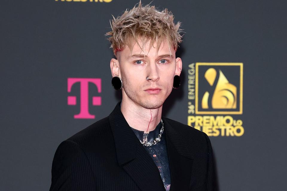 <p>Romain Maurice/Getty</p> Machine Gun Kelly in Miami in February 2024