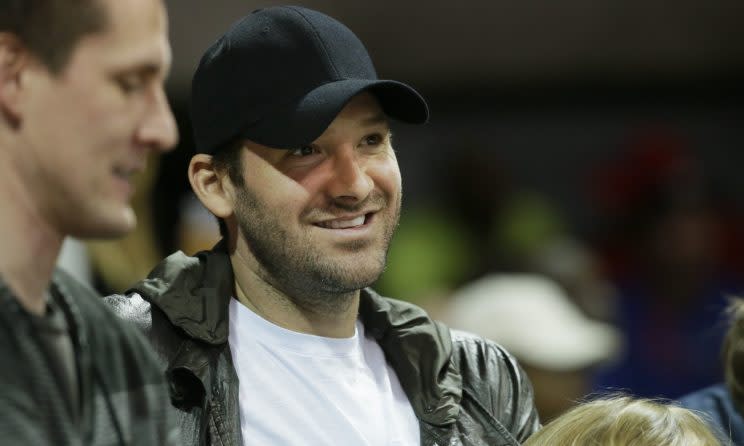 Tony Romo could be traded, not cut, according to a report. (AP)