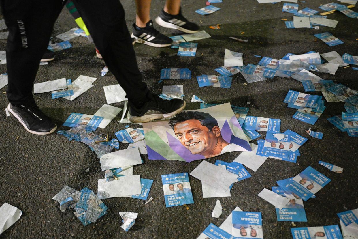 Campaign handouts for Argentine presidential candidate Sergio Massa are seen on the ground.