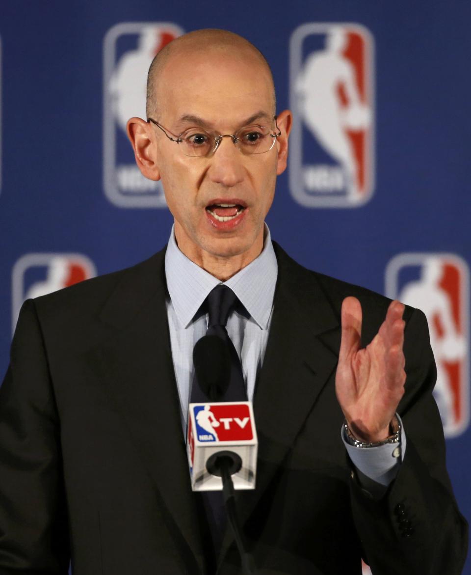 NBA Commissioner Adam Silver speaks at a news conference in New York April 29, 2014. Silver announced that Los Angeles Clippers owner Donald Sterling was banned for life and heavily fined by the NBA on over racist comments he made. REUTERS/Mike Segar (UNITED STATES - Tags: SPORT BASKETBALL)