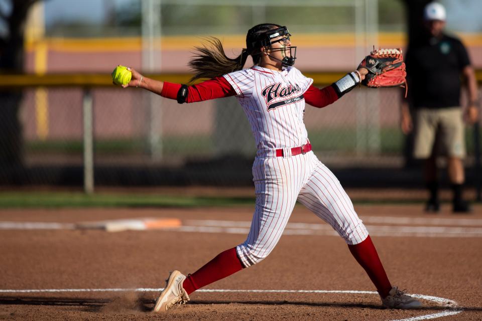 Centennial Hawk Caprice Barela pitches the ball during the first round of the state softball tournament on Friday, May 5, 2023, at the Field of Dreams.