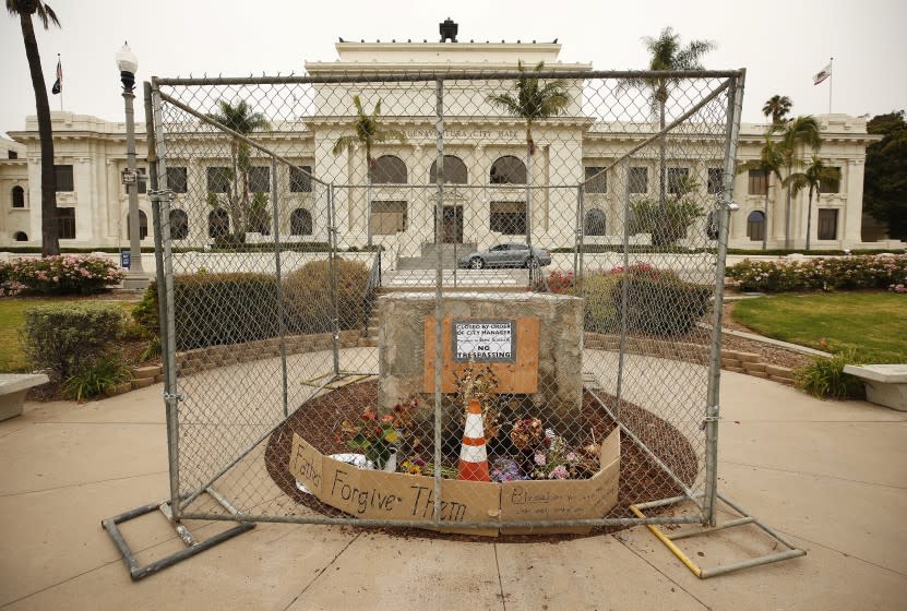 VENTURA, CA - JULY 23: The empty stand in front of Ventura City Hall that held the bronze statue of Father Junipero Serra who founded nine Spanish missions in California including Mission San Buenaventura. The monument, originally commissioned in the 1930s but replaced in 1989 with a bronze replica was removed by the city in the early pre dawn hours of Thursday July 23, 2020. Ventura City Council voted last week to remove the statue on public property and put it into storage until it can be placed at the Mission Buenaventura. The move comes after a Father Serra statue was toppled weeks ago on Olvera St. in downtown Los Angeles. Ventura City Hall on Thursday, July 23, 2020 in Ventura, CA. (Al Seib / Los Angeles Times)