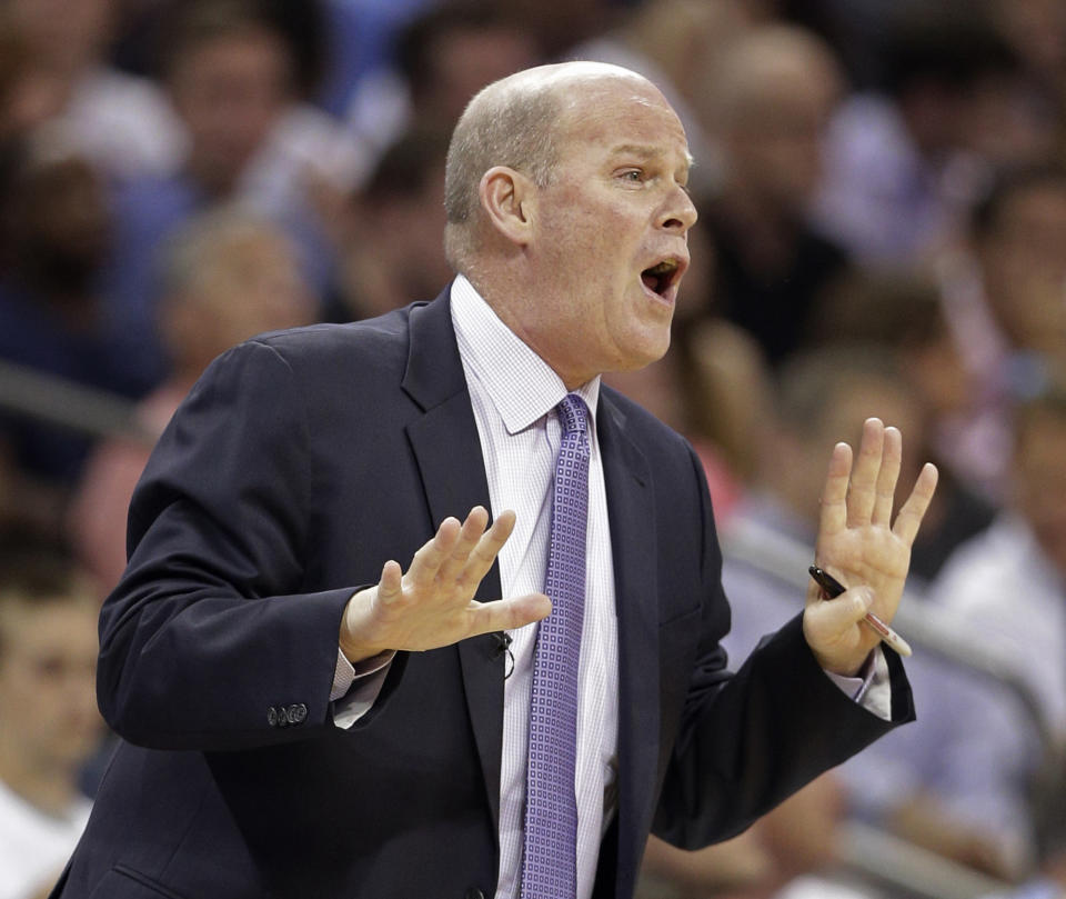 Charlotte Bobcats coach Steve Clifford talks to his players during the first half in Game 4 of an opening-round NBA basketball playoff series against the Miami Heat in Charlotte, N.C., Monday, April 28, 2014. (AP Photo/Chuck Burton)