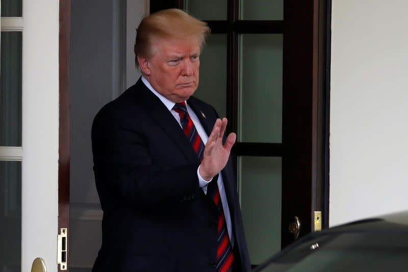 U.S. President Donald Trump waves goodbye to South Korea's President Moon Jae-In after their meeting at the White House in Washington, U.S., May 22, 2018. REUTERS/Carlos Barria