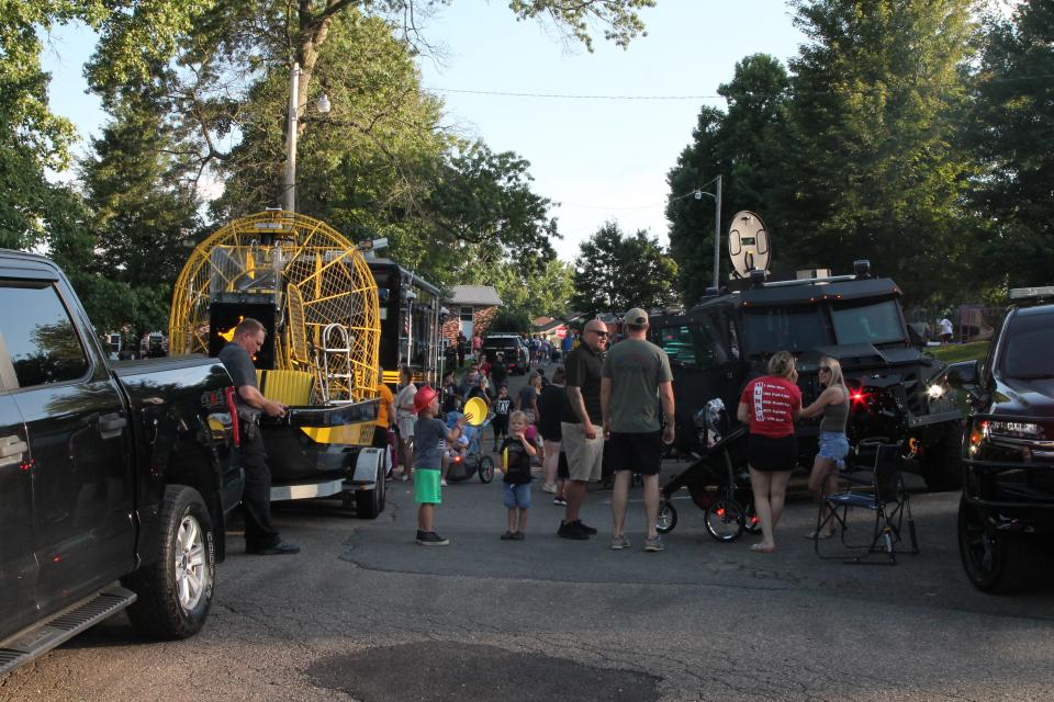 Over 25 law enforcement, and first responders vehicles were on display for residents to check out during National Night Out at Cambridge City Park.