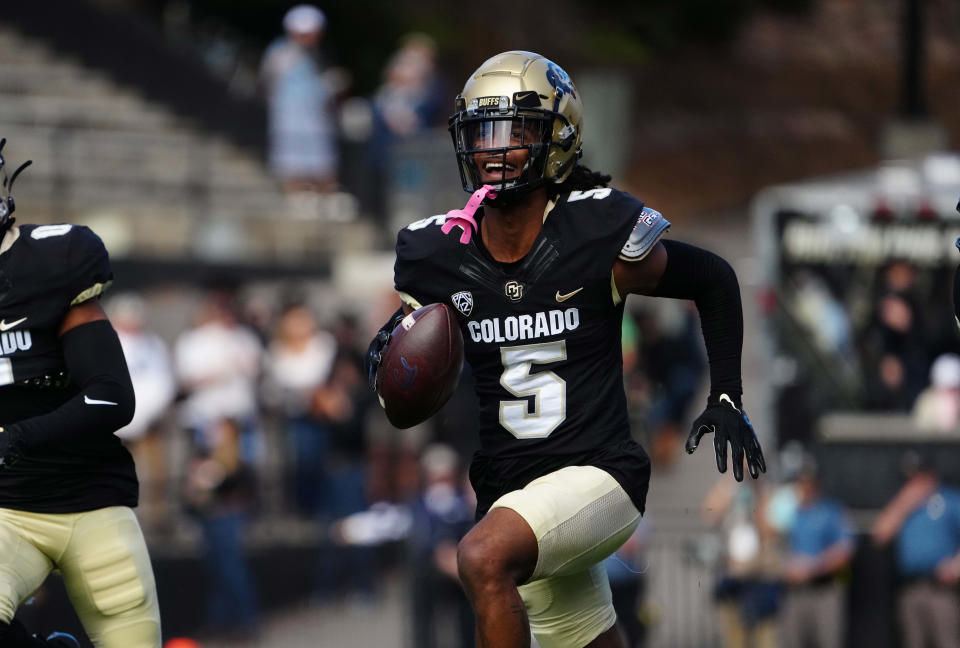 Colorado Buffaloes safety Tyrin Taylor (5) celebrates his interception in the first quarter against the California Golden Bears at Folsom Field on Oct. 15, 2022.