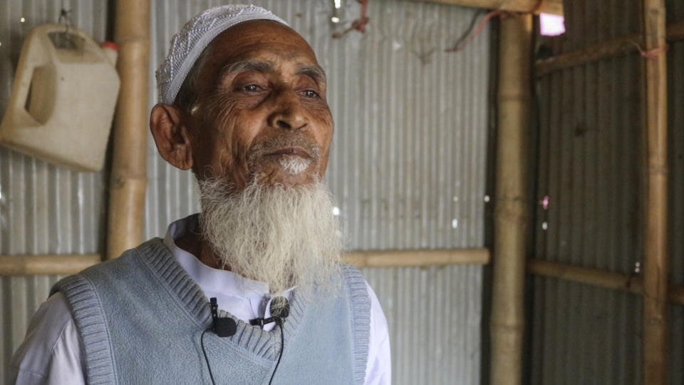 Rohingya refugee Mohammad Jaffar, 70, talks to the Associated Press at the Balukhali refugee camp in Cox's Bazar, Bangladesh, Tuesday, Feb.2, 2021. Rohingya refugees from Myanmar living in camps in Bangladesh are condemning the military coup in their homeland and saying it makes them more fearful to return. “Repatriation will not be safe at all under this regime because the very people who are responsible for killing, torturing, raping, our mothers and sisters, have now come in power. After all this suffering we ran and came here. Now if we go back into the hands of people who are responsible for our torture, we will probably have to bear twice as much pain as before.”, Jaffar said.(AP Photo/Shafiqur Rahman)