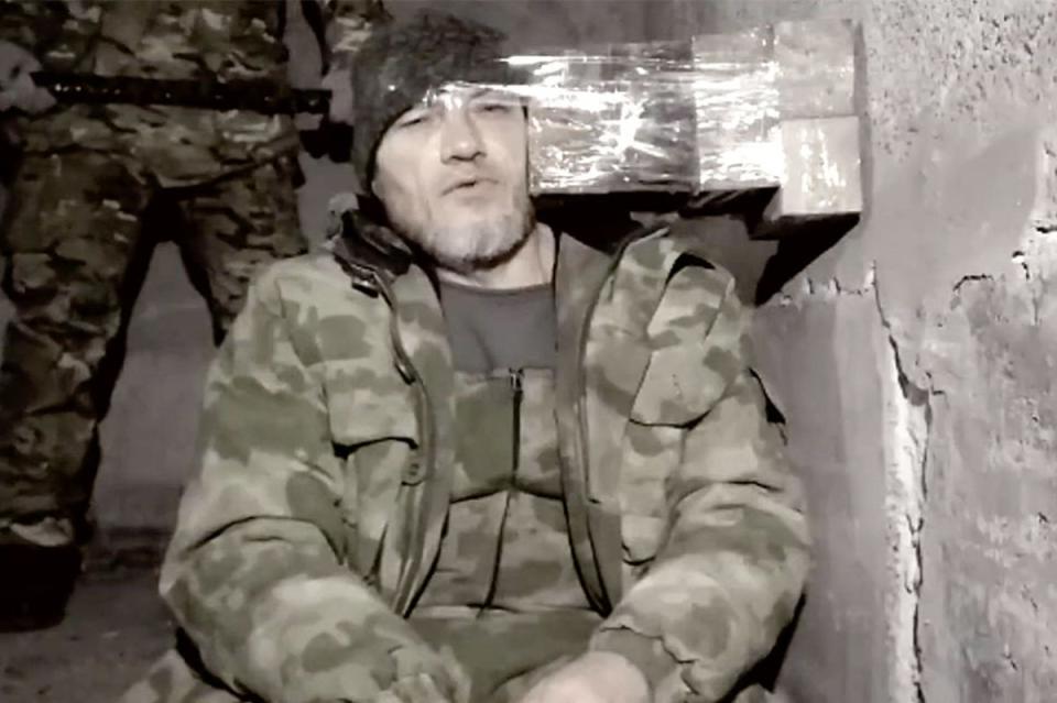 Dmitry Yakushchenko (pictured) had his head taped to bricks with clingfilm  (Telegram)