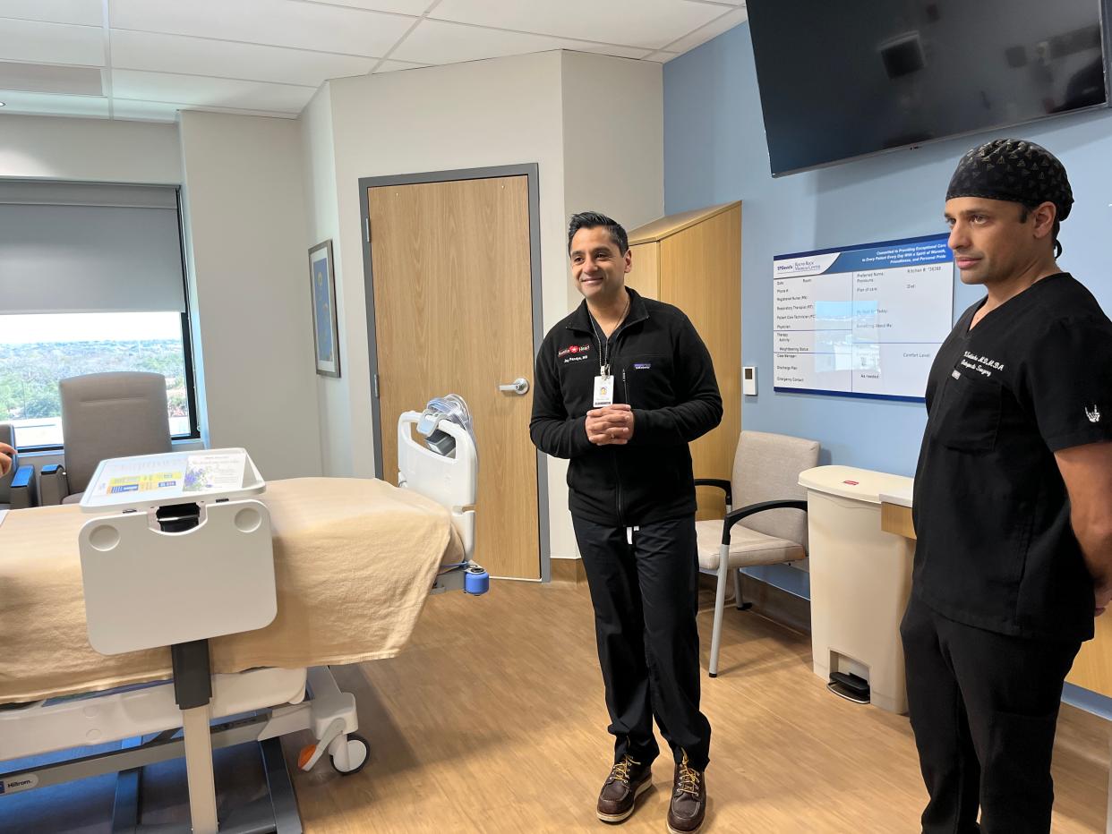 Dr. Jay Pandya, interventional cardiologist, and Dr. Vilas Saldanha, an orthopedic trauma surgeon, look at St. David's Round Rock Medical Center's new rooms in the expansion, which is expected to receive its first patients on Jan. 23.