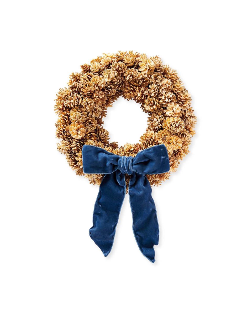 <p><strong>$248.00</strong></p><p>This wreath’s wintery mix of pine cones and velvet is both understated and elegant. </p>