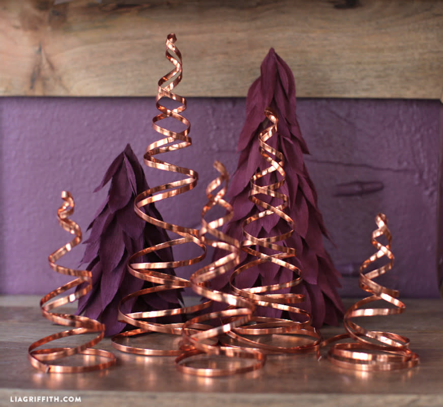 <p>Lia Griffith</p><p>If you aren’t a fan of pine trees, you’ll adore these copper trees that your munchkins can help you craft this winter. <em><a href="https://liagriffith.com/copper-wire-spiral-trees/?sscid=91k7_11ppof" rel="nofollow noopener" target="_blank" data-ylk="slk:Lia Griffith;elm:context_link;itc:0;sec:content-canvas" class="link rapid-noclick-resp">Lia Griffith</a></em> can give you the tutorial.</p><p><strong>Related: <a href="https://parade.com/living/christmas-activities" rel="nofollow noopener" target="_blank" data-ylk="slk:75 Christmas Activities to Intentionally Make the Season Oh-So-Bright;elm:context_link;itc:0;sec:content-canvas" class="link rapid-noclick-resp">75 Christmas Activities to Intentionally Make the Season Oh-So-Bright</a></strong></p>