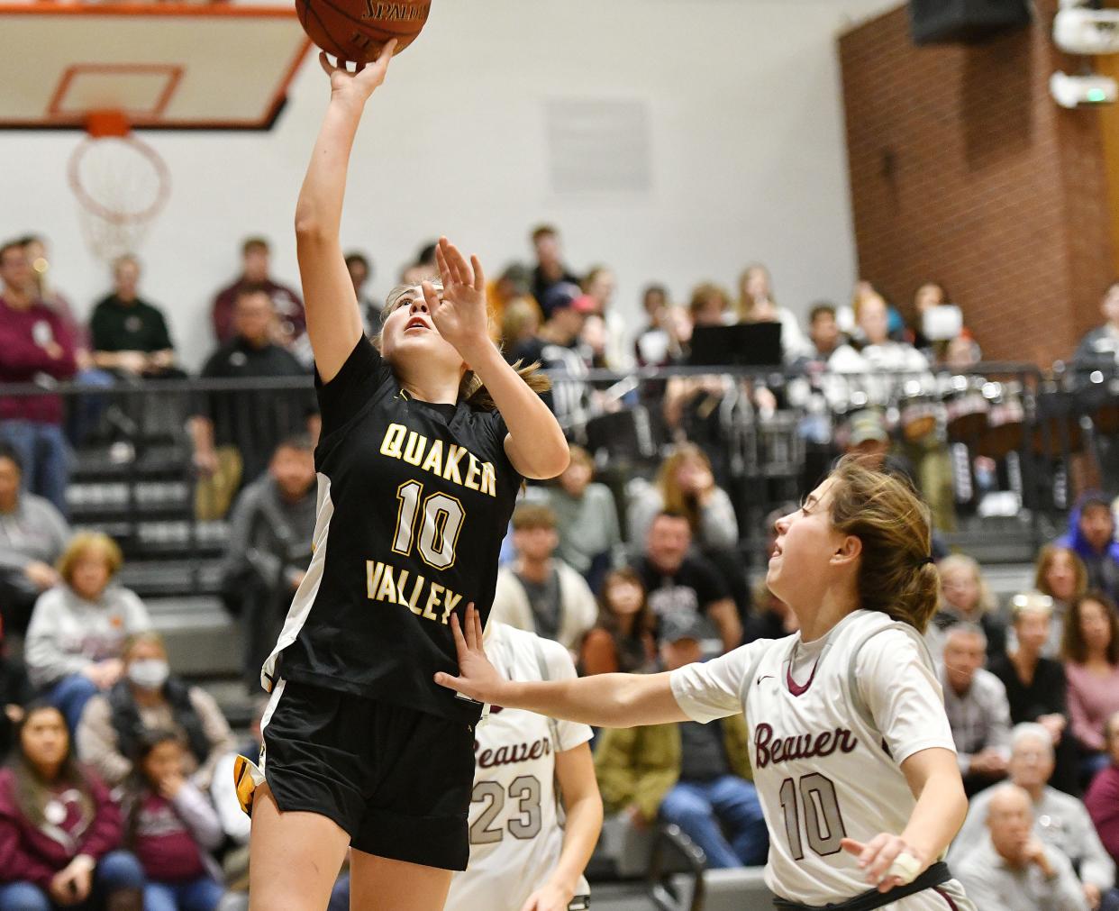 Quaker Valley's Nora Johns shoots as Beaver's Emerson Connelly defends during the Thursday, Jan. 5 game at Beaver Area High School.