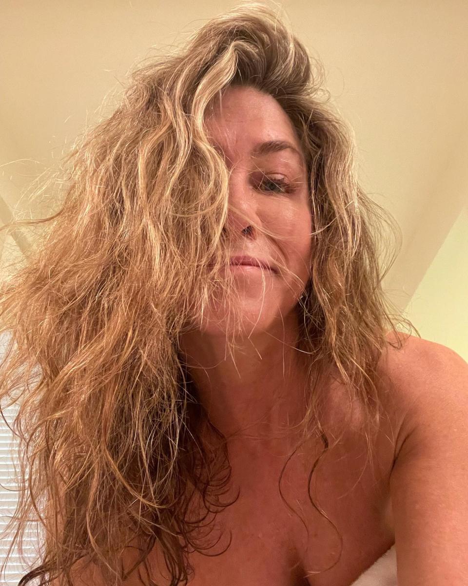 "OK humidity ... let's go," Jen captioned this makeup-free photo in January, showing off her natural hair.