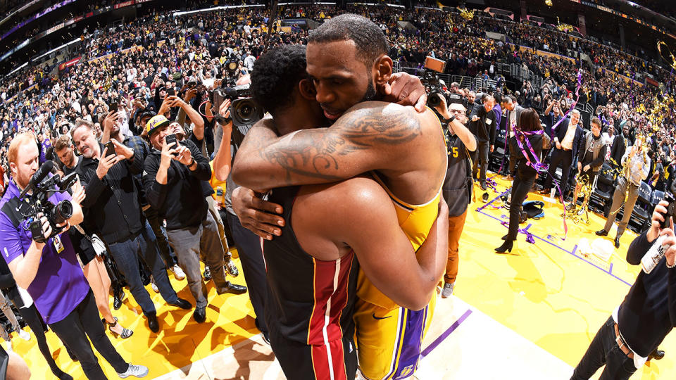 The pair share a powerful embrace. Pic: Getty