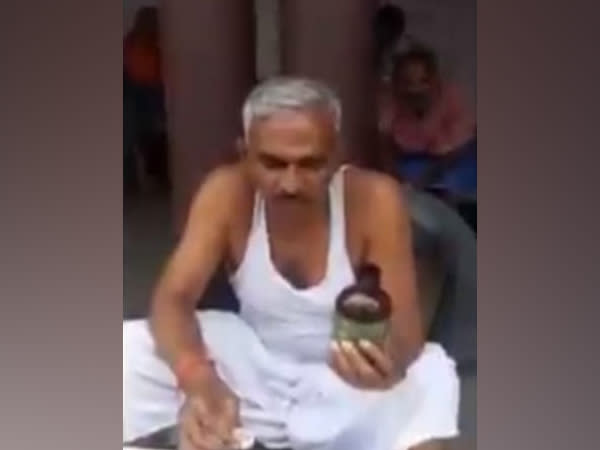 Surendra Singh, BJP MLA from Bairia in Ballia district, has put up a video of himself drinking cow urine. (Photo/ANI)