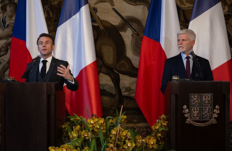 President of the Czech Republic Petr Pavel (R) and French President Emmanuel Macron speak during a joint press conference. Øíhová Michaela/CTK/dpa