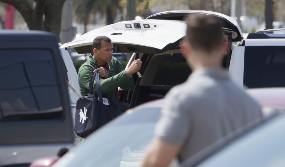 New York Yankees' Alex Rodriguez arrives at the Yankees minor league complex for spring training in Tampa, Florida, February 23, 2015. REUTERS/Scott Audette (UNITED STATES - Tags: SPORT BASEBALL)