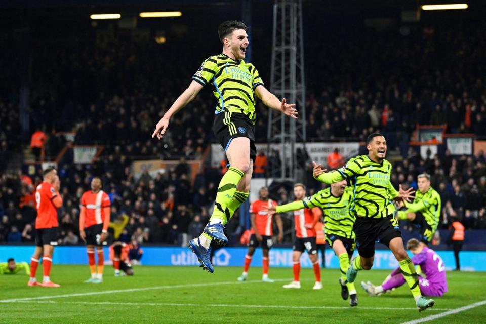 Declan Rice celebrates after his 97th minute winner clinched the points for Arsenal (AFP via Getty Images)